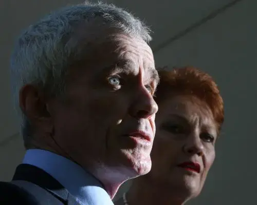 Senator Roberts' Conspiracy Theories Under Scrutiny Amid One Nation's Rise